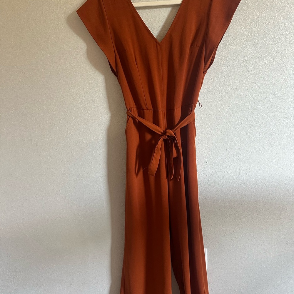 A New Day Orange Jumpsuit with Flutter Cap Sleeves